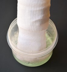 Bubble sock blower in bubble mix 